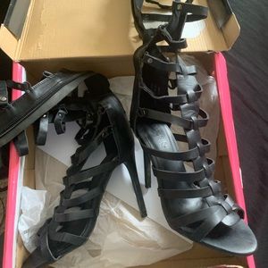 Black heels mid calf length.